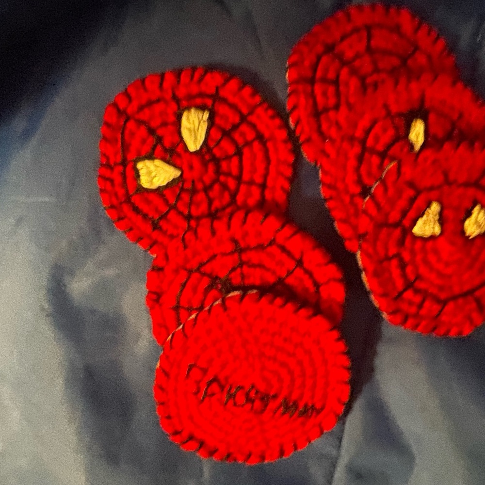Hand crocheted six piece Spider-Man coasters